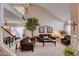 Bright living room featuring high ceilings and neutral tones, creating an inviting atmosphere at 7109 Deepriver Cir, Las Vegas, NV 89129