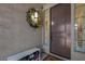 Covered porch with exterior light and decor at 7260 Grace Estate Ave, Las Vegas, NV 89113