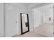 Bright hallway with a full-length mirror and access to other rooms in the home at 7260 Grace Estate Ave, Las Vegas, NV 89113
