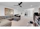 Expansive living area with plush seating and ample space for entertaining at 7260 Grace Estate Ave, Las Vegas, NV 89113