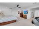 Large main bedroom with TV and neutral carpet and walls at 7260 Grace Estate Ave, Las Vegas, NV 89113