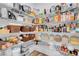Well-organized walk-in pantry filled with food, drinks, and cooking essentials at 7260 Grace Estate Ave, Las Vegas, NV 89113