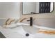 Stylish bathroom vanity with a modern faucet, beautiful countertop, and neutral decor at 806 Fireweed Dr, Henderson, NV 89002