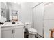 Bathroom featuring a toilet, vanity with sink, and shower with sliding glass doors at 820 Bernini St, Las Vegas, NV 89144