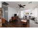 Spacious living room featuring wood floors, an open layout, and neutral decor, creating a cozy atmosphere at 820 Bernini St, Las Vegas, NV 89144