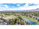 Expansive aerial view of a lush golf course community, blending luxury living with scenic outdoor recreation at 8800 Cortile Dr, Las Vegas, NV 89134