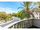 Scenic view from the balcony featuring palm trees and neighborhood landscape at 8800 Cortile Dr, Las Vegas, NV 89134