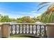 View from the balcony offering neighborhood views and mature trees at 8800 Cortile Dr, Las Vegas, NV 89134