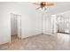 Bonus room with neutral paint, and an adjacent room with a staircase at 8800 Cortile Dr, Las Vegas, NV 89134