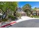 Charming two-story home with mature landscaping and a three-car garage, perfect for Gathering living and curb appeal at 8800 Cortile Dr, Las Vegas, NV 89134