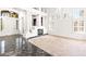 Spacious living room with high ceilings and modern fireplace at 8800 Cortile Dr, Las Vegas, NV 89134