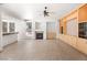 Open floor plan with fireplace, built-in cabinets and wet bar area near the kitchen at 8800 Cortile Dr, Las Vegas, NV 89134