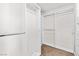 Well-organized walk-in closet with built-in shelves and hanging rods for storage at 8800 Cortile Dr, Las Vegas, NV 89134