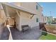 Cozy backyard featuring a covered patio and a seating bench at 9053 Entrancing Ave, Las Vegas, NV 89149