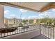 Charming balcony view overlooks the street, showcasing the neighborhood's appeal at 9053 Entrancing Ave, Las Vegas, NV 89149