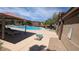 Relaxing community pool area with lounge chairs, perfect for enjoying sunny days and outdoor recreation at 9053 Entrancing Ave, Las Vegas, NV 89149