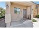 Inviting front porch with stylish pillars, enhancing curb appeal of the home at 9053 Entrancing Ave, Las Vegas, NV 89149