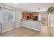 Bright, airy kitchen with wood cabinets, black appliances, and sliding glass doors at 9053 Entrancing Ave, Las Vegas, NV 89149