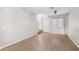 Bright living area showcasing wood floors and a view to the staircase at 9053 Entrancing Ave, Las Vegas, NV 89149