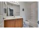 Well-lit bathroom featuring a vanity and a shower-tub combination at 9140 Entrancing Ave, Las Vegas, NV 89149