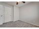 Bedroom features neutral paint, carpet flooring, and a closet at 9140 Entrancing Ave, Las Vegas, NV 89149
