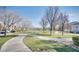 View of the neighborhood park with walking path and community green space at 9140 Entrancing Ave, Las Vegas, NV 89149