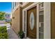 Home features a front door with decorative glass and elegant accents at 939 Paisley St, Las Vegas, NV 89145