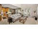 Bright living room with an open floorplan to the kitchen and dining area at 939 Paisley St, Las Vegas, NV 89145