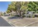 Exterior shot of mailboxes outside the office with ample parking and mature shade trees on a sunny day at 939 Paisley St, Las Vegas, NV 89145