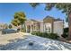 Exterior of the office with adjacent parking and lush shrubs and trees, creating a welcoming environment at 939 Paisley St, Las Vegas, NV 89145