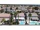 Aerial view of the property highlighting the backyard oasis with a pool and lush landscaping at 9585 Teton Diablo Ave, Las Vegas, NV 89117