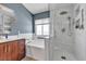 Stylish bathroom featuring modern fixtures, separate bathtub, and glass-enclosed walk-in shower at 9585 Teton Diablo Ave, Las Vegas, NV 89117