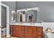 Modern bathroom with double sink vanity, neutral paint and stylish fixtures at 9585 Teton Diablo Ave, Las Vegas, NV 89117