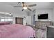 Well lit Primary bedroom, ceiling fan and multiple drawers at 9585 Teton Diablo Ave, Las Vegas, NV 89117
