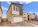 Modern two-story home with a two-car garage and contemporary design at 9886 Alpine Style Dr, Las Vegas, NV 89166