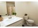 Cozy bathroom with a single sink, updated fixtures, and stylish decor at 10021 Locking Biner Ave, Las Vegas, NV 89166