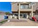 A cozy, private back patio with a tiled area and landscaped gravel sections for outdoor enjoyment at 1073 Pleasure Ln # 2, Henderson, NV 89002