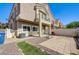 A well maintained backyard featuring a mix of tiled and gravel areas, perfect for outdoor living at 1073 Pleasure Ln # 2, Henderson, NV 89002
