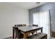 Contemporary dining room features a gray marble table with seating for six, creating a modern space at 1073 Pleasure Ln # 2, Henderson, NV 89002