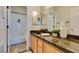 This is a bathroom featuring a vanity with granite countertop, and a shower-tub combination at 1274 Doggett Ave, Las Vegas, NV 89123