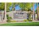 Elegant stone entrance sign for the Camden Park community with manicured landscaping at 1274 Doggett Ave, Las Vegas, NV 89123