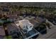 View of the home in a desirable neighborhood, showcasing its well-maintained landscaping and curb appeal at 1556 Olivia Pkwy, Henderson, NV 89011
