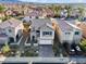 View of the home in a desirable neighborhood, showcasing its well-maintained landscaping and curb appeal at 1556 Olivia Pkwy, Henderson, NV 89011