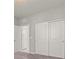 Bedroom with closet with sliding doors and an open entrance to a smaller room at 1556 Olivia Pkwy, Henderson, NV 89011