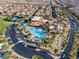 Aerial view of a resort style community pool featuring lounge chairs and cabanas at 1556 Olivia Pkwy, Henderson, NV 89011