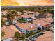 Panoramic aerial view of the residential area with lush trees, landscaped yards, and well-maintained homes at 1613 Shadow Rock Dr, Las Vegas, NV 89117