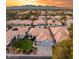An aerial view showcases a well-maintained single-Gathering home with desert landscaping at 1613 Shadow Rock Dr, Las Vegas, NV 89117