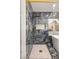 Modern bathroom with gold fixtures, large shower, and rainfall showerhead at 1613 Shadow Rock Dr, Las Vegas, NV 89117
