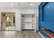 Bedroom with a sliding glass door to the patio, built-in shelves, and a fireplace at 1613 Shadow Rock Dr, Las Vegas, NV 89117