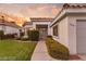 Beautiful home featuring manicured landscaping, a tile roof, and a welcoming front entryway at 1613 Shadow Rock Dr, Las Vegas, NV 89117